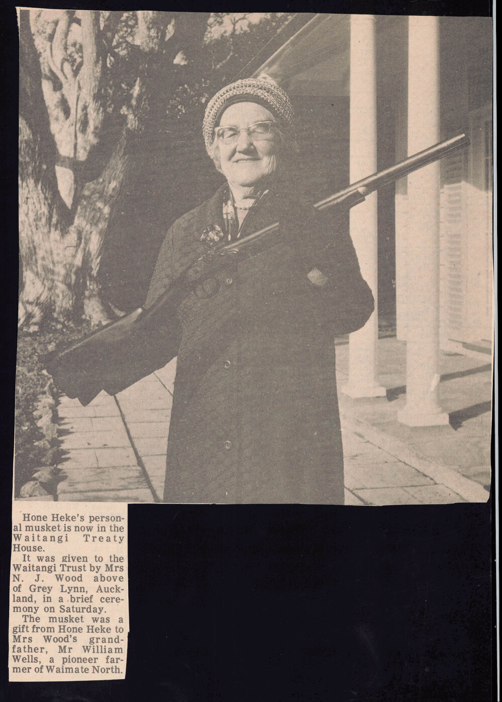  N J Wood giving Hone Heke's musket to Waitangi Treaty House.