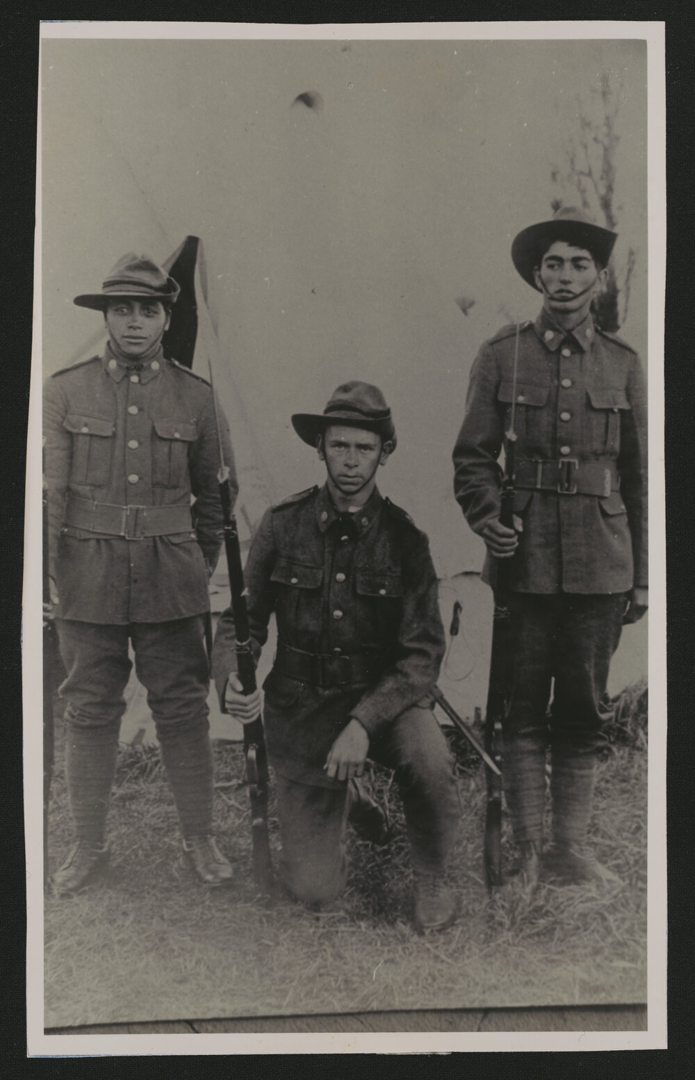 Three men in uniform