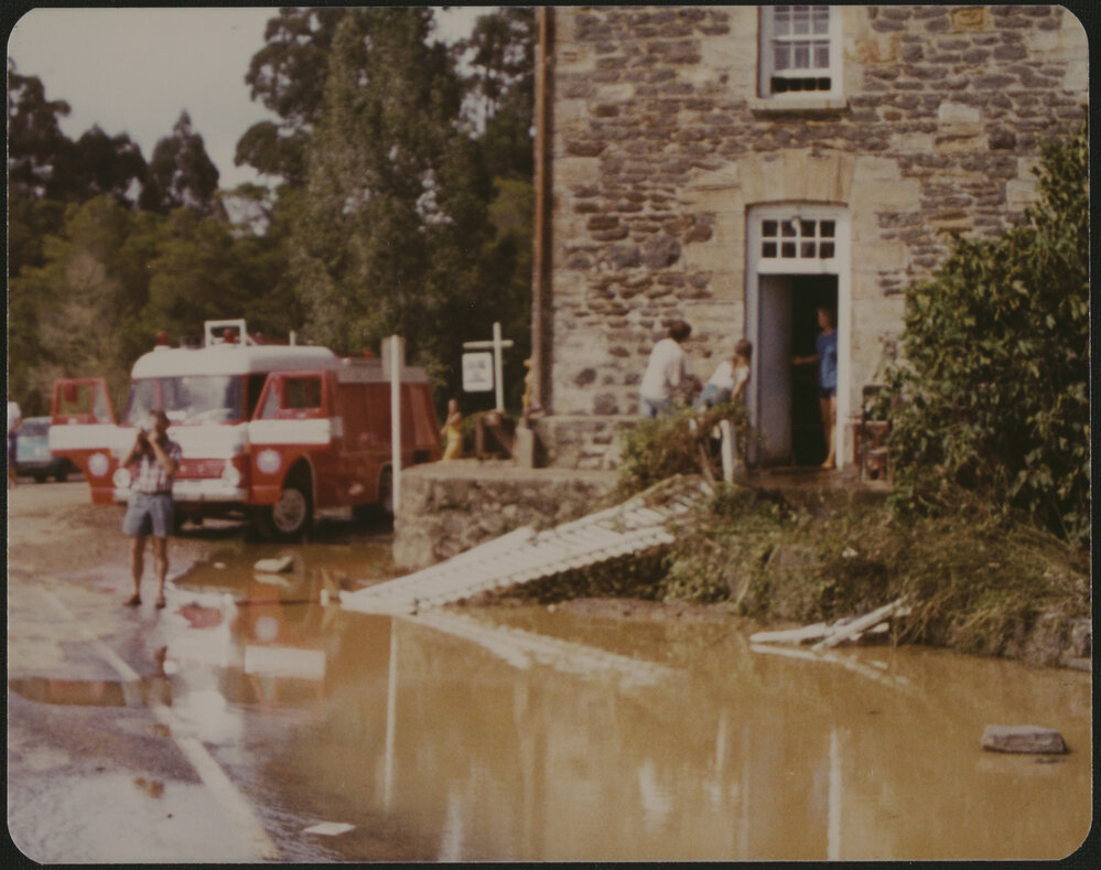 Fire engine outside the flooded Stone Store