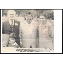 Young Robert Henare shoulders a cloak