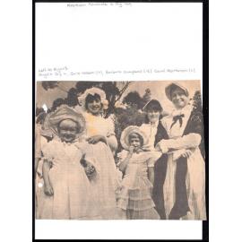 Photograph of young girls in 19th century dress