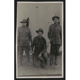 Three men in uniform
